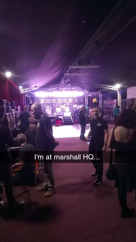 Guitarists performing together at Marshall HQ